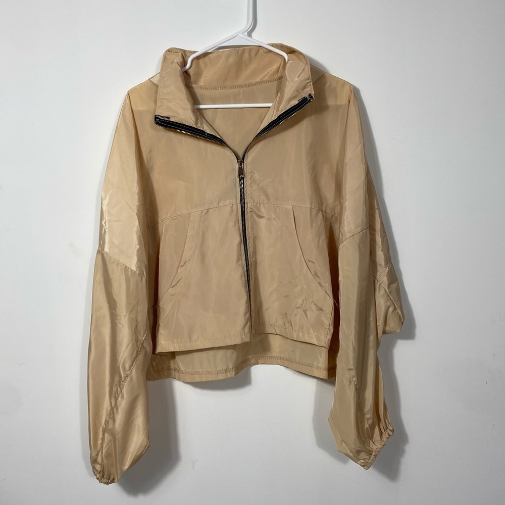 Beige windbreaker